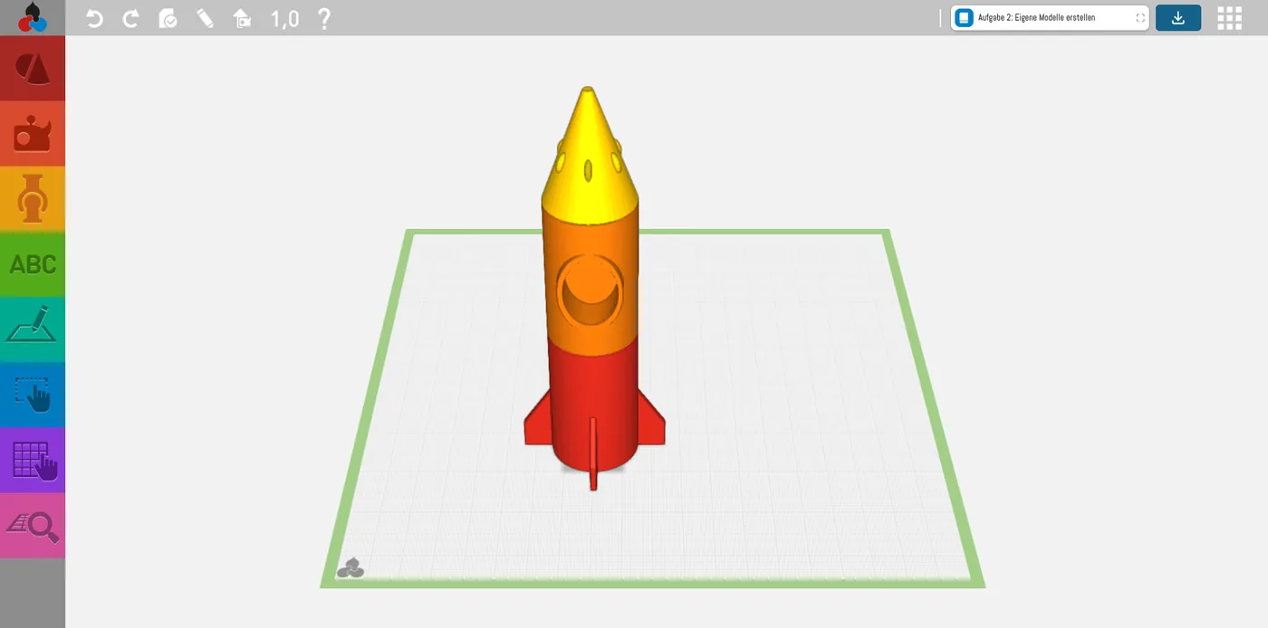 Baukasten mit einer selbst konstruierten Rakete, oben die Aufgabe „Eigene Modelle erstellen“